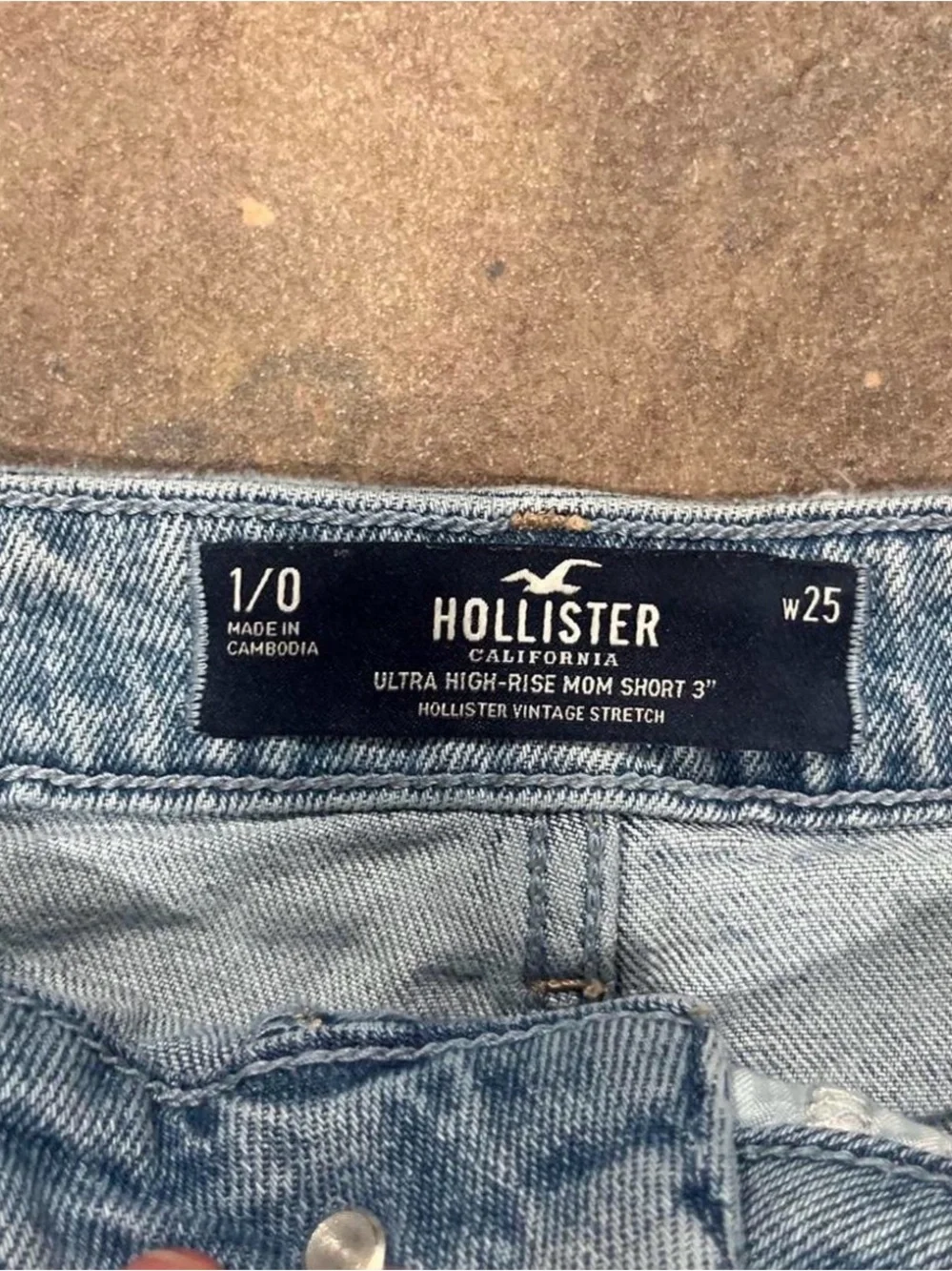 Light blue denim shorts with frayed hem